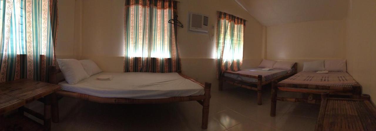 Se San Beach Resort-Isla De Gigantes Carles Экстерьер фото