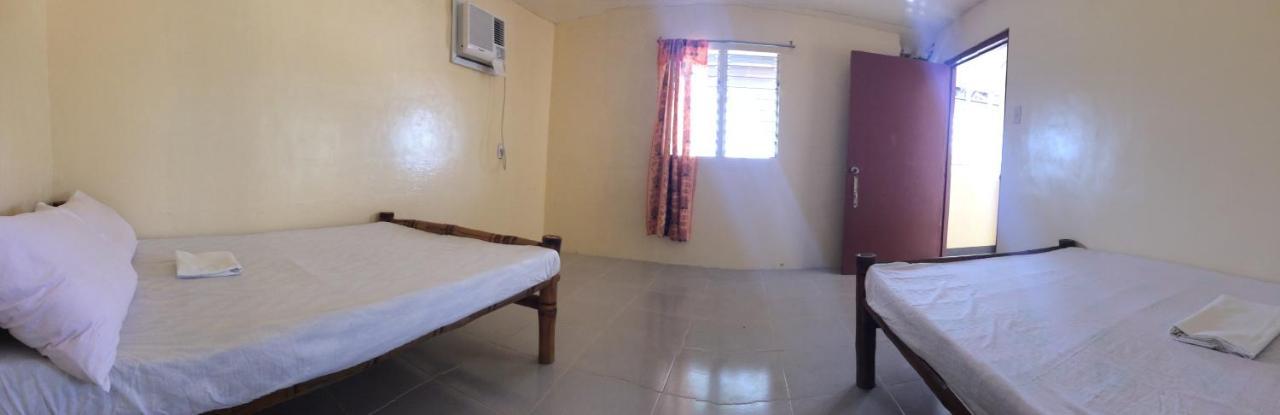 Se San Beach Resort-Isla De Gigantes Carles Экстерьер фото