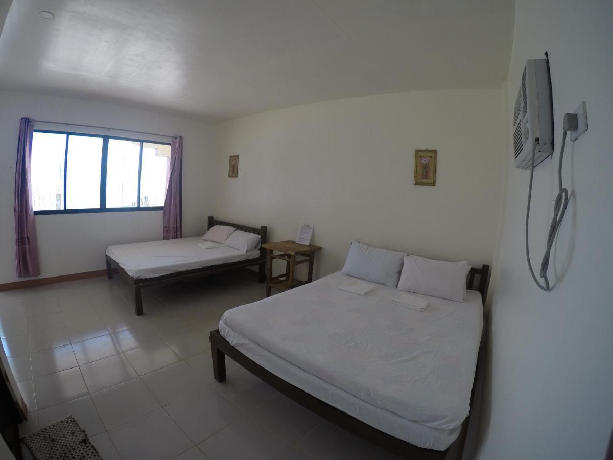 Se San Beach Resort-Isla De Gigantes Carles Экстерьер фото